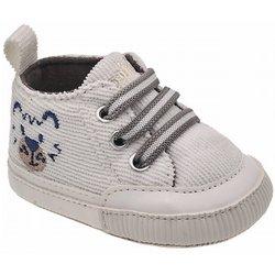 Zapatos niño Chicco nursery modelo Ocland para primera puesta color balnco crema con trigre azul en el lateral zapatillas barefoot Chicco para recien nacido calzado respetuoso muy comodo con suela blanca de tela